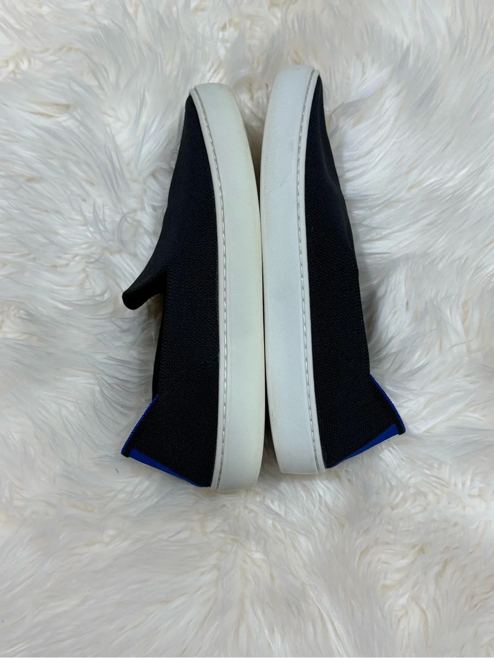 Rothy's Black Knit Slip-On Sneakers with Blue Accent